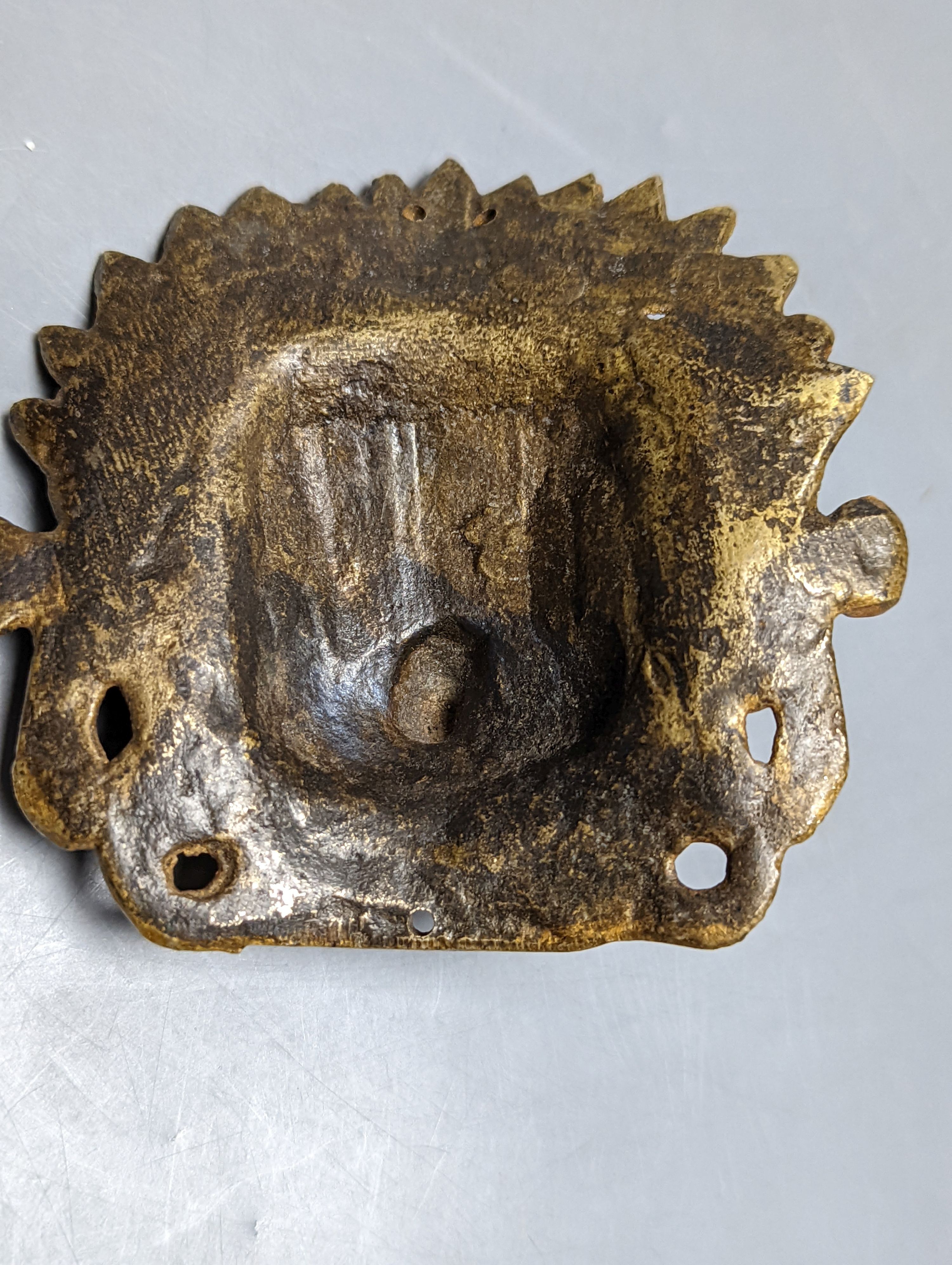 A Chinese jade carving of a resting horse, 7cm and a Himalayan cast gilt-bronze mount